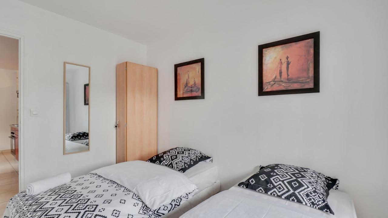 Апартаменты Chic Apart With Parking Near Paris Обервилье Экстерьер фото