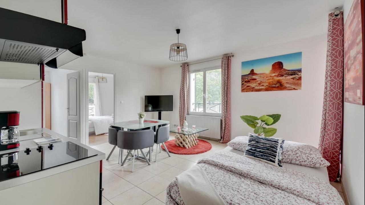 Апартаменты Chic Apart With Parking Near Paris Обервилье Экстерьер фото